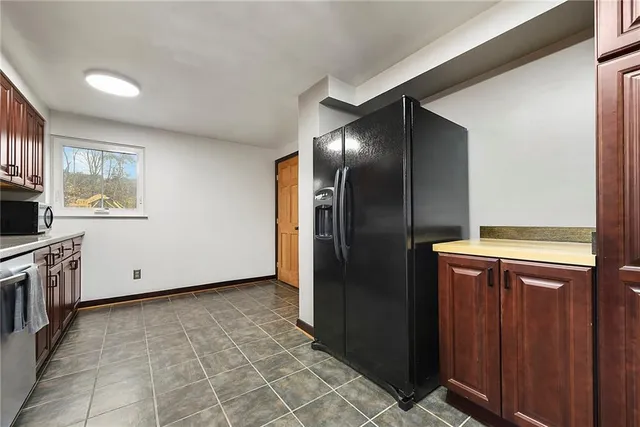 a bathroom with a sink vanity and a mirror