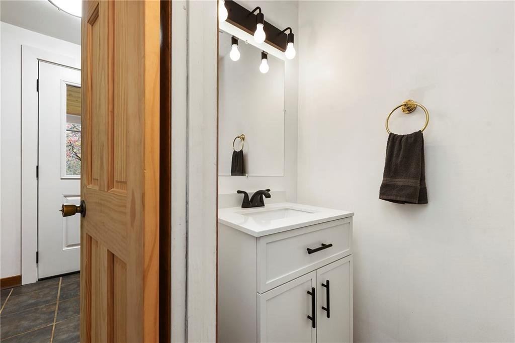 201 Joe Cain Road Bulger, PA 15019 - Photo 32 of 49 a bathroom with a sink vanity and a mirror