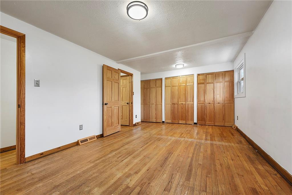 201 Joe Cain Road Bulger, PA 15019 - Photo 35 of 49 an empty room with wooden floor and windows