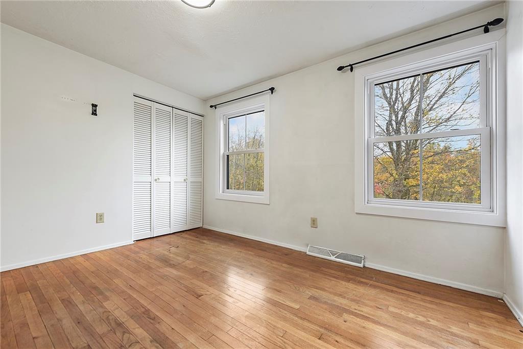 201 Joe Cain Road Bulger, PA 15019 - Photo 41 of 49 an empty room with wooden floor and windows
