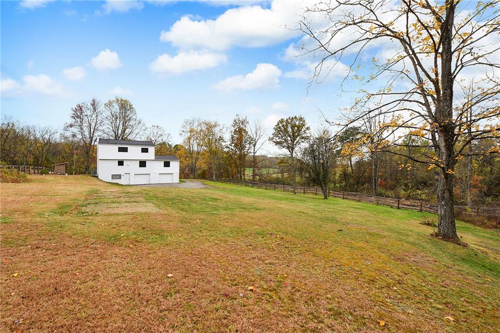 201 Joe Cain Road Bulger, PA 15019 - Photo 43 of 49 a white building with trees in the background