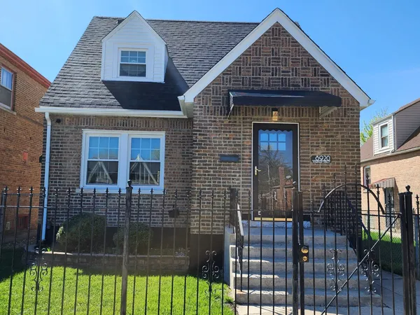 a front view of a house with garage