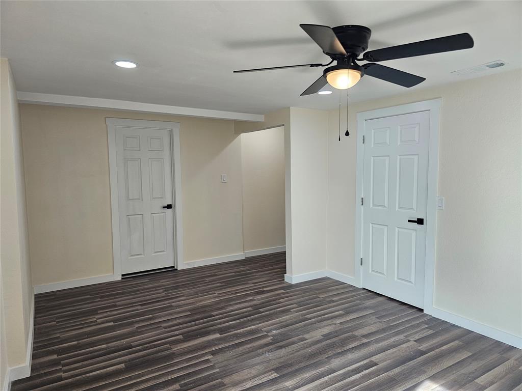 4317 Gram Lane Bellmead, TX 76705 - Photo 13 of 34 wooden floor in an empty room