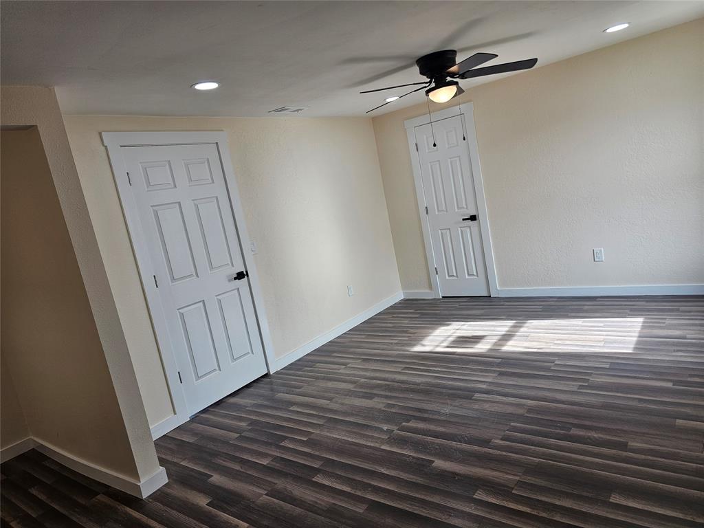 4317 Gram Lane Bellmead, TX 76705 - Photo 15 of 34 a view of empty room with wooden floor