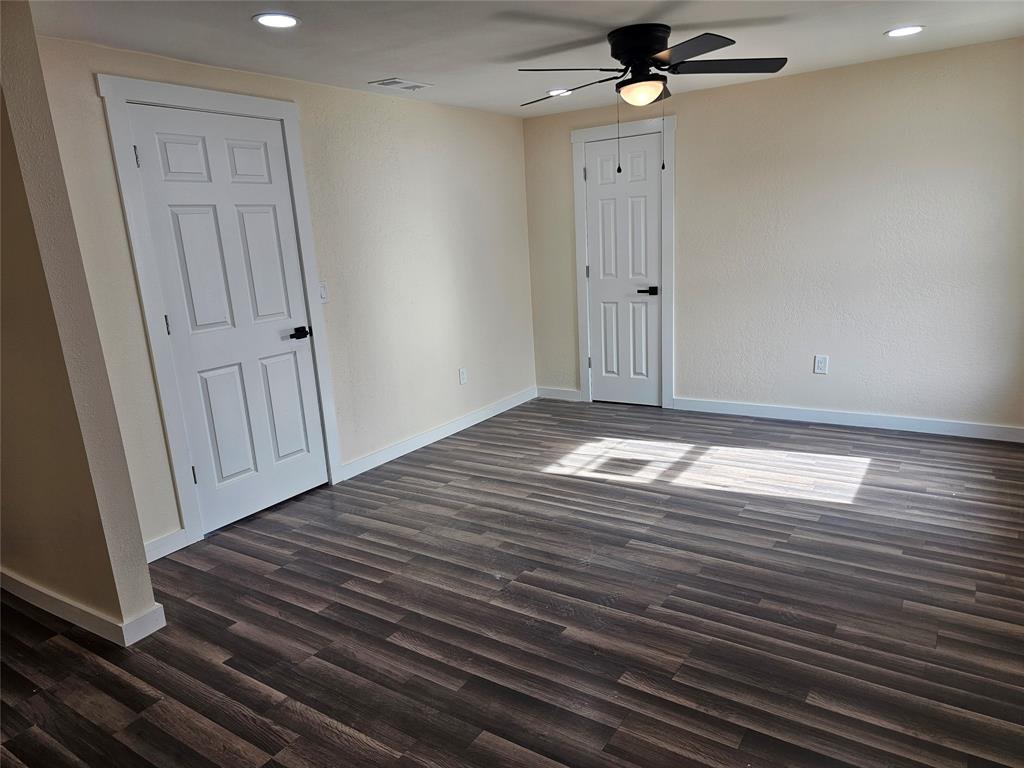 4317 Gram Lane Bellmead, TX 76705 - Photo 19 of 34 a view of empty room with wooden floor