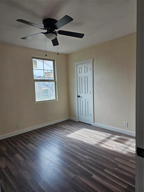 4317 Gram Lane Bellmead, TX 76705 - Photo 27 of 34 a view of an empty room with wooden floor and a window