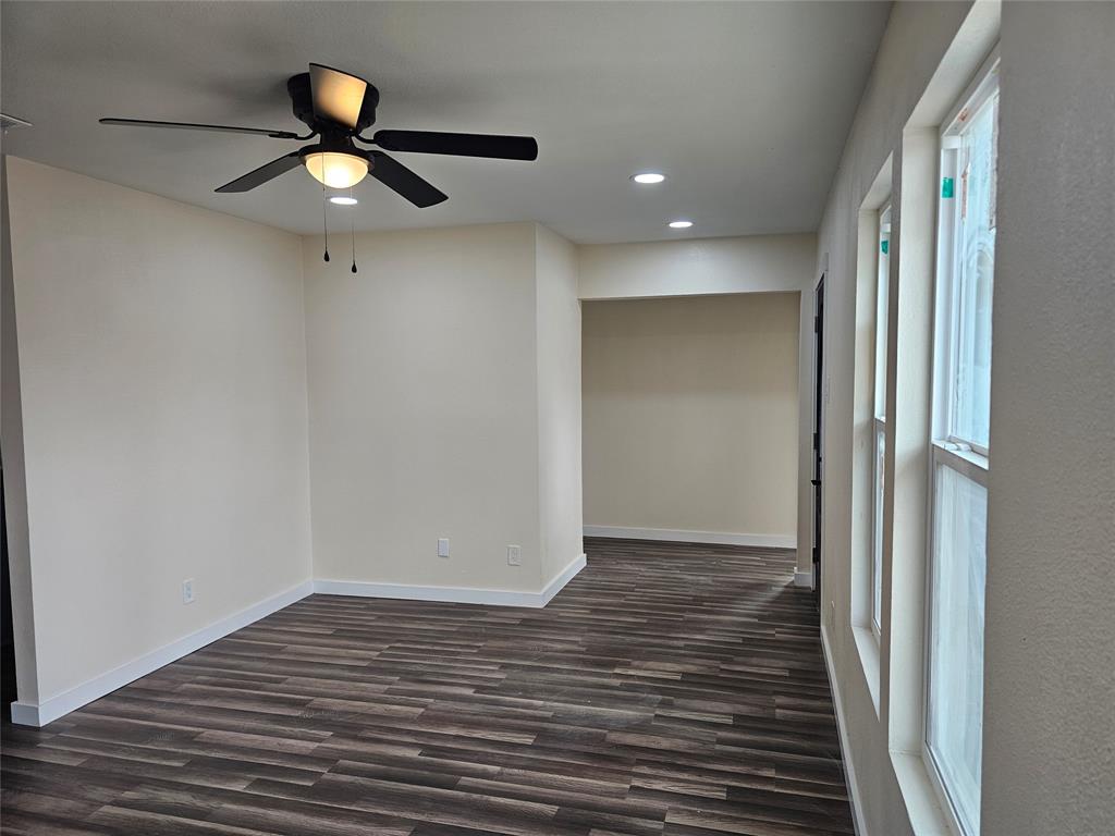 4317 Gram Lane Bellmead, TX 76705 - Photo 5 of 34 a view of empty room with wooden floor
