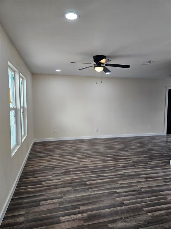 4317 Gram Lane Bellmead, TX 76705 - Photo 6 of 34 a view of a room with a sink and wooden floor