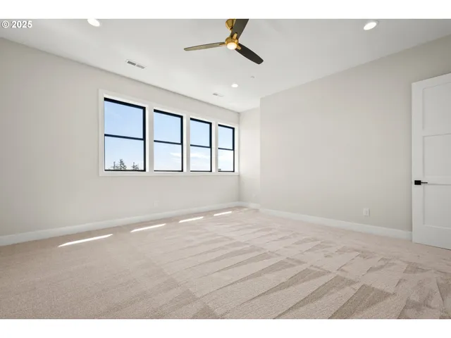 a view of a chairs and table in the balcony
