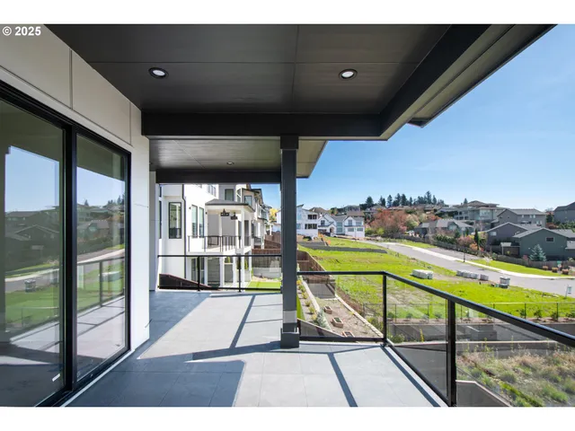 a view of houses with outdoor space and lake view