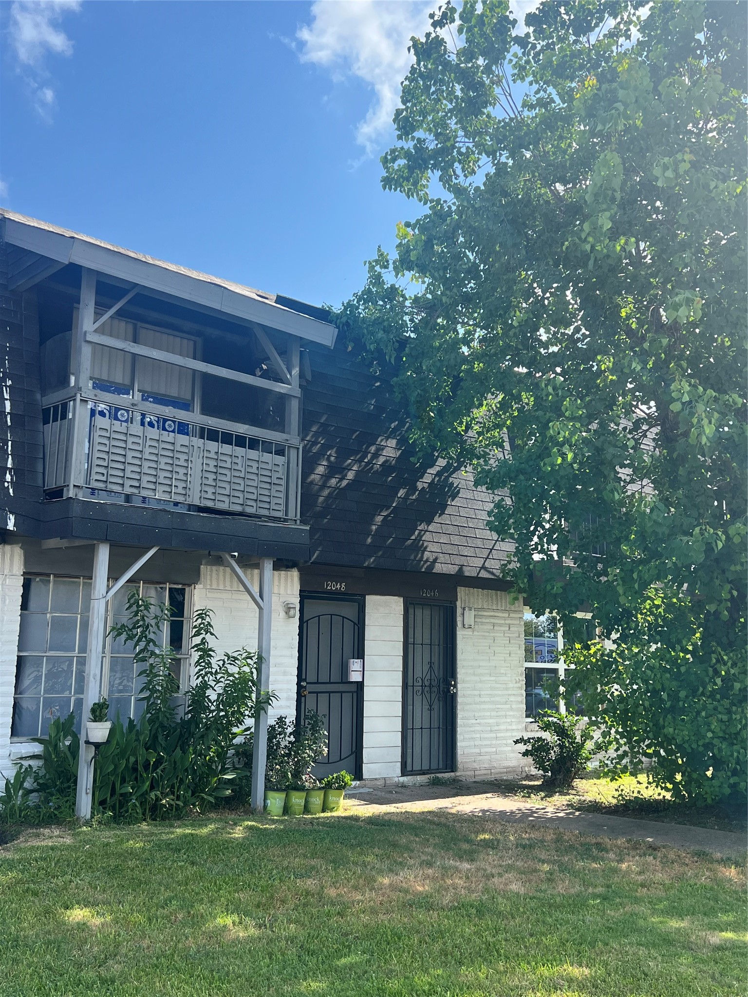12048 Beechnut Street Houston, TX 77072 - Photo 15 of 21 a view of a house with a yard balcony and sitting area