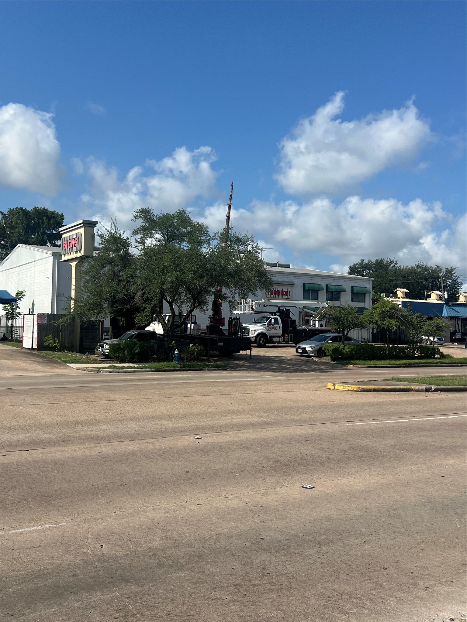 12048 Beechnut Street Houston, TX 77072 - Photo 17 of 21 a view of street with cars