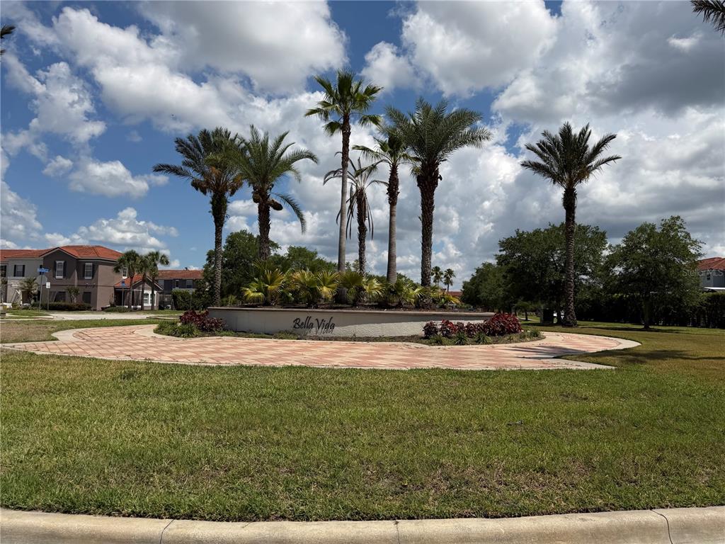 4573 Ada Lane Kissimmee, FL 34746 - Photo 36 of 37 a view of a swimming pool and tall trees