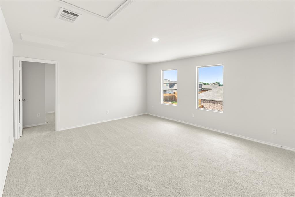 1702 Potomac Lane Blue Ridge, TX 75424 - Photo 17 of 27 an empty room with windows and closet