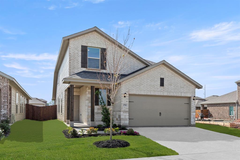 1702 Potomac Lane Blue Ridge, TX 75424 - Photo 2 of 27 a front view of a house with a yard