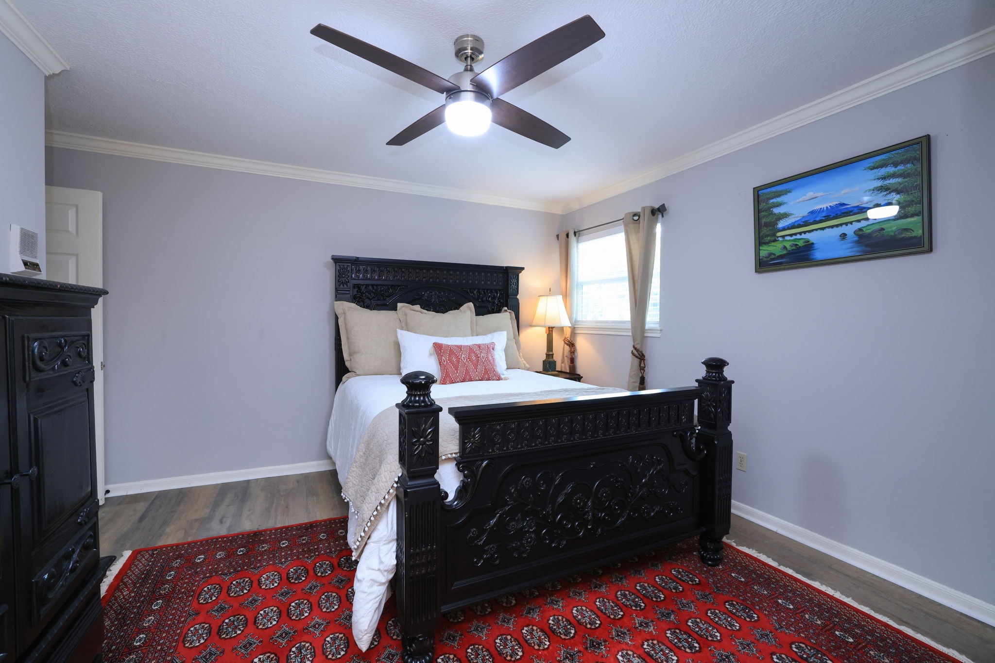 16123 Chasemore Drive Spring, TX 77379 - Photo 40 of 50 This is another bedroom on the second floor that features wood floors and ceiling fan. All windows have been changed to double pane.