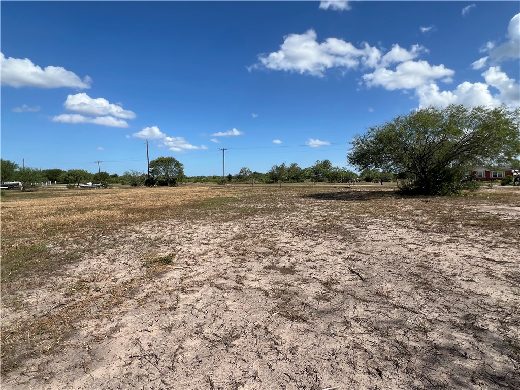 310 Cr Orange Grove, TX 78372 - Photo 23 of 32 a view of a lake with sunset