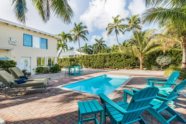 a view of a lake with a sitting space