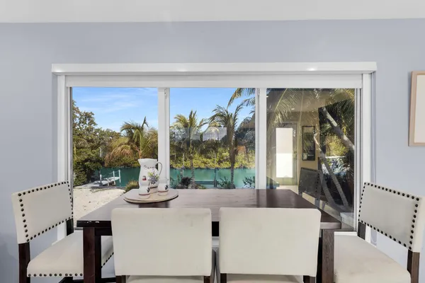 a kitchen with stainless steel appliances granite countertop a sink and a stove