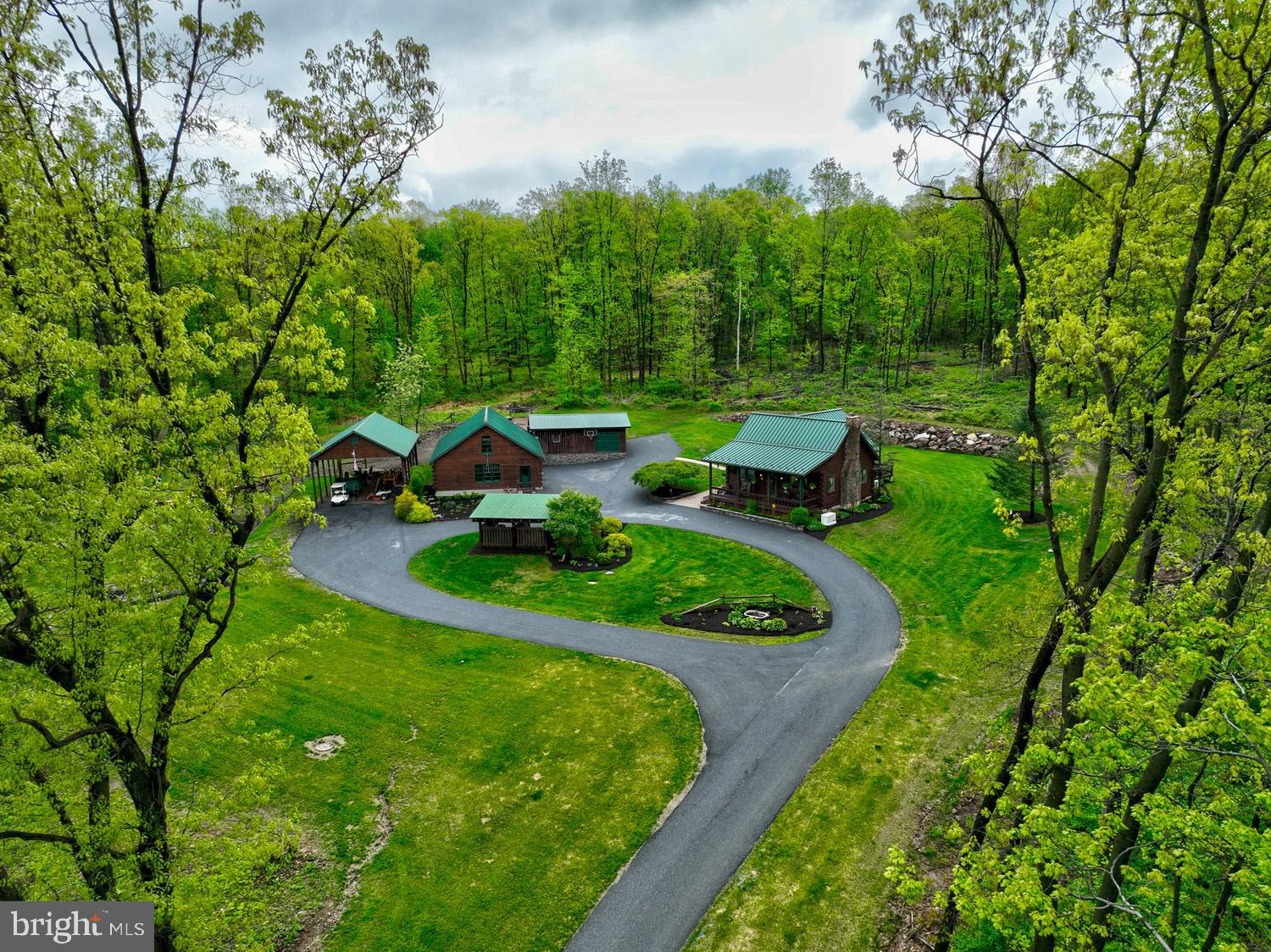 491 Sheep Hill Road Newmanstown, PA 17073 - Photo 28 of 30 a view of a garden with an outdoor seating