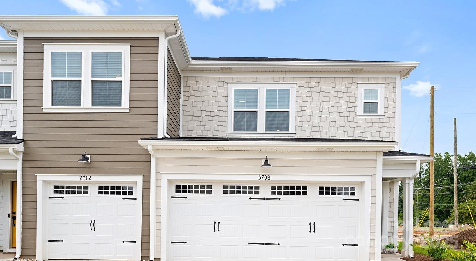 a view of a building with a street sign
