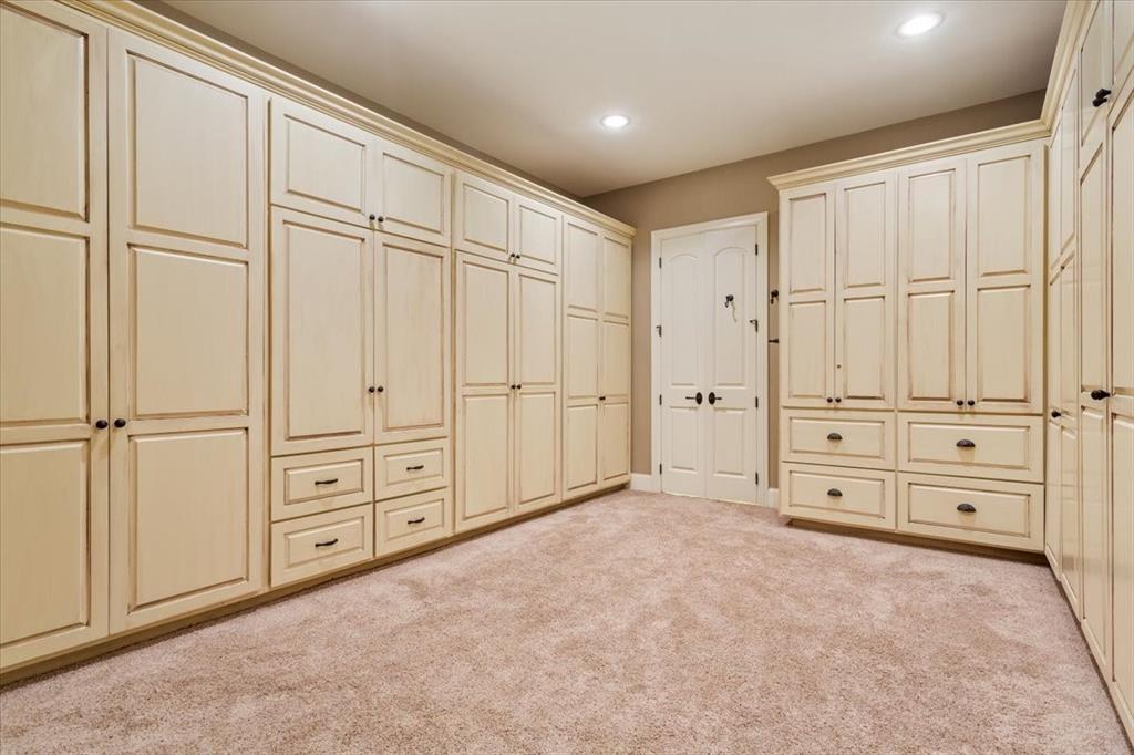 10020 Hidden Bluff Waco, TX 76657 - Photo 23 of 40 an empty room with cabinet area