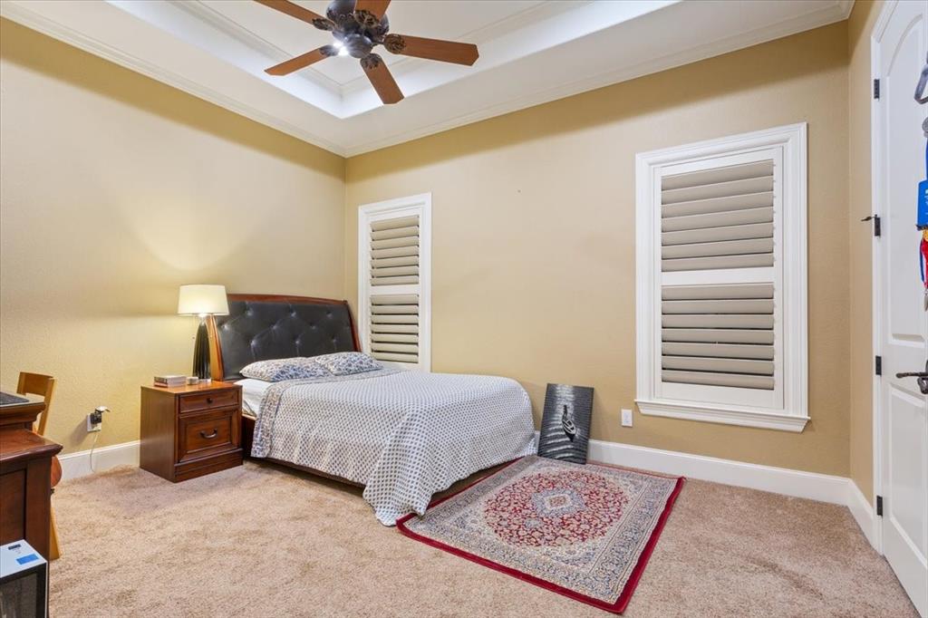 10020 Hidden Bluff Waco, TX 76657 - Photo 27 of 39 a bedroom with two beds and painted walls
