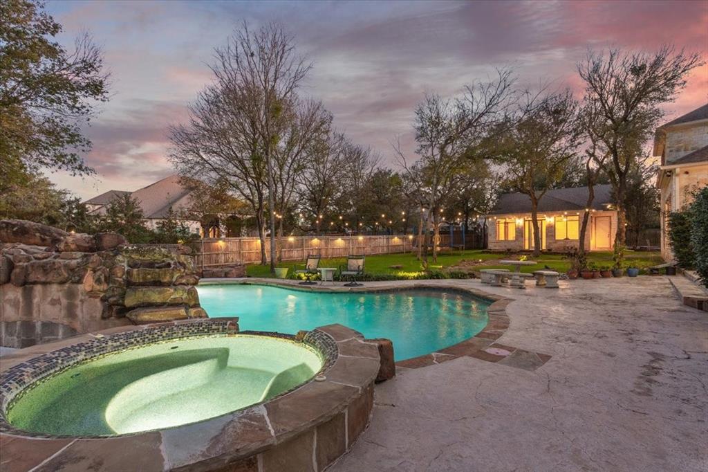 10020 Hidden Bluff Waco, TX 76657 - Photo 34 of 40 a backyard with swimming pool and green space
