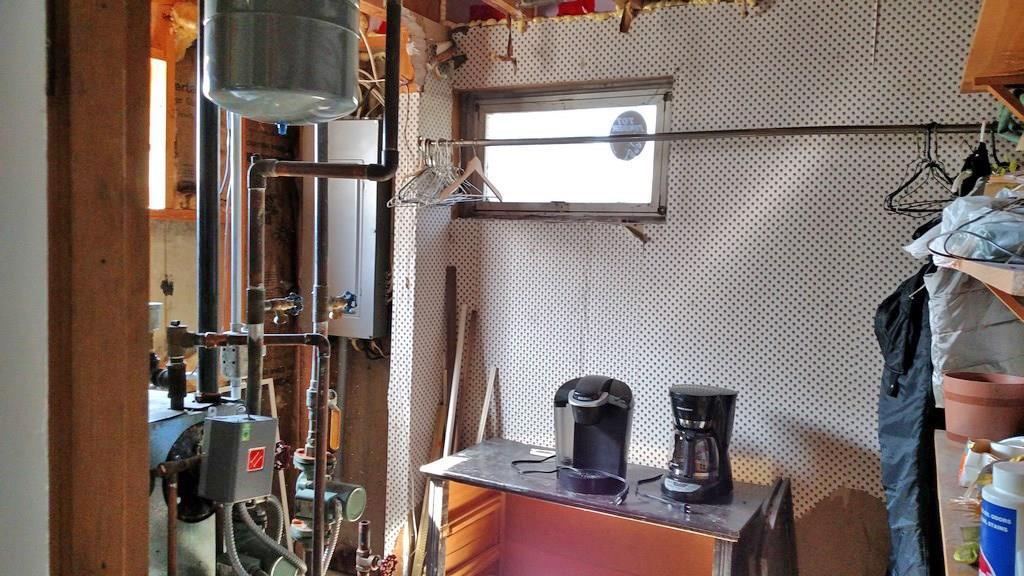 305 Main Road Eddington, ME 04428 - Photo 27 of 35 Furnace room has some storage space...