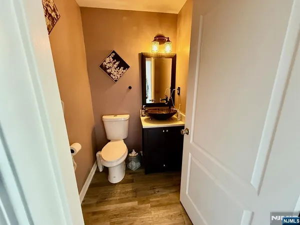 a bathroom with a toilet and a sink