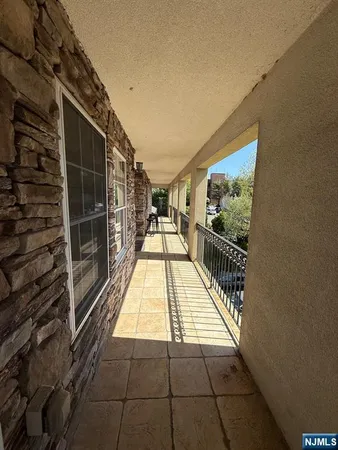 a view of balcony with door