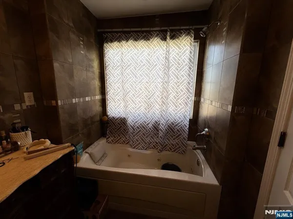 a bathroom with a sink and a shower
