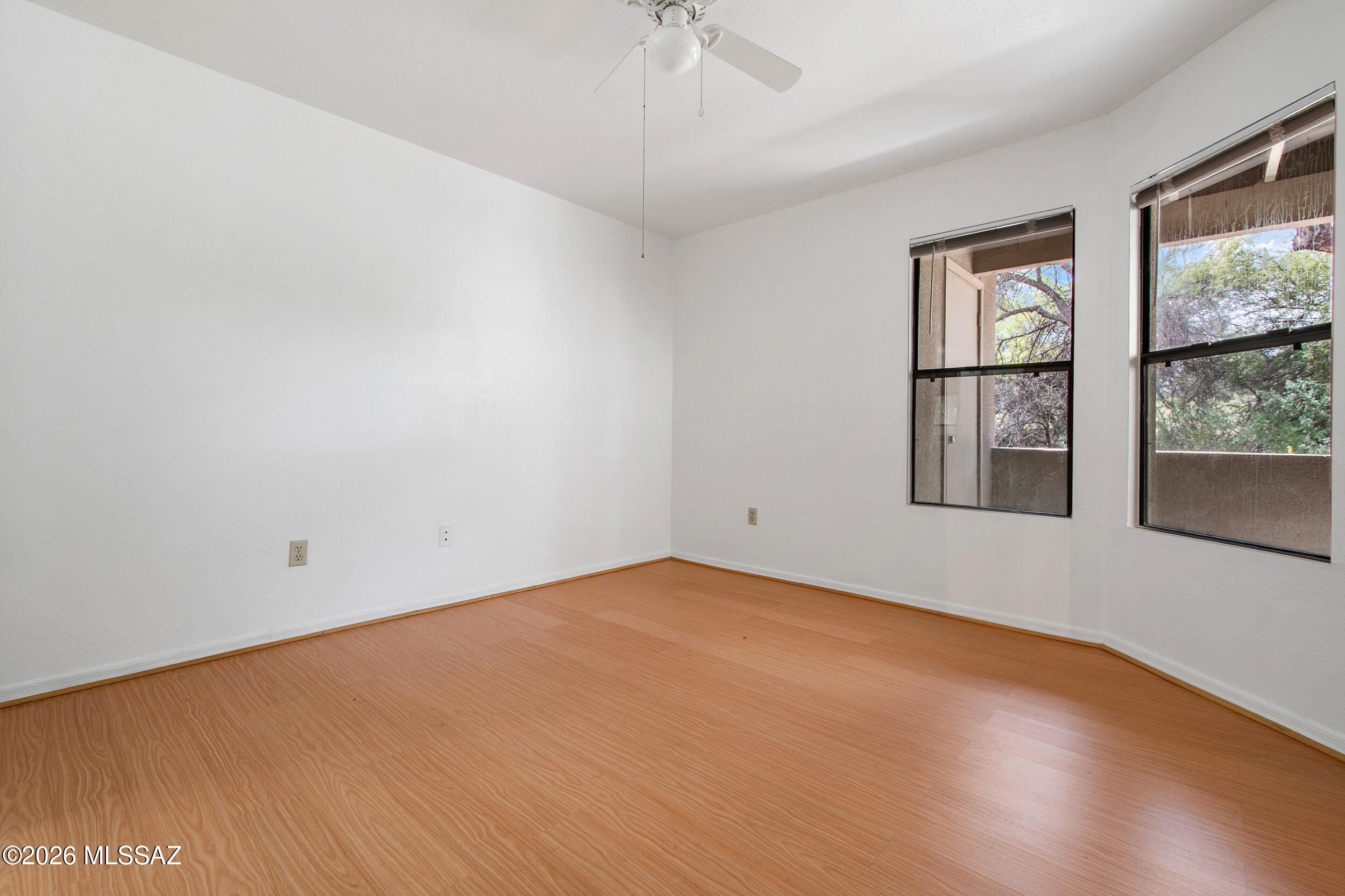 5855 North Kolb Road, Unit 6103 Tucson, AZ 85750 - Photo 4 of 31 a view of an empty room with a window