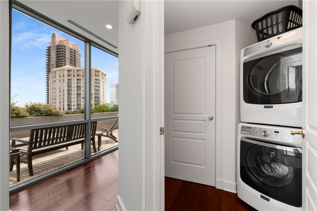 700 Park Regency Place Northeast, Unit 2201 Atlanta, GA 30326 - Photo 17 of 47 a view of washer and dryer in a utility room