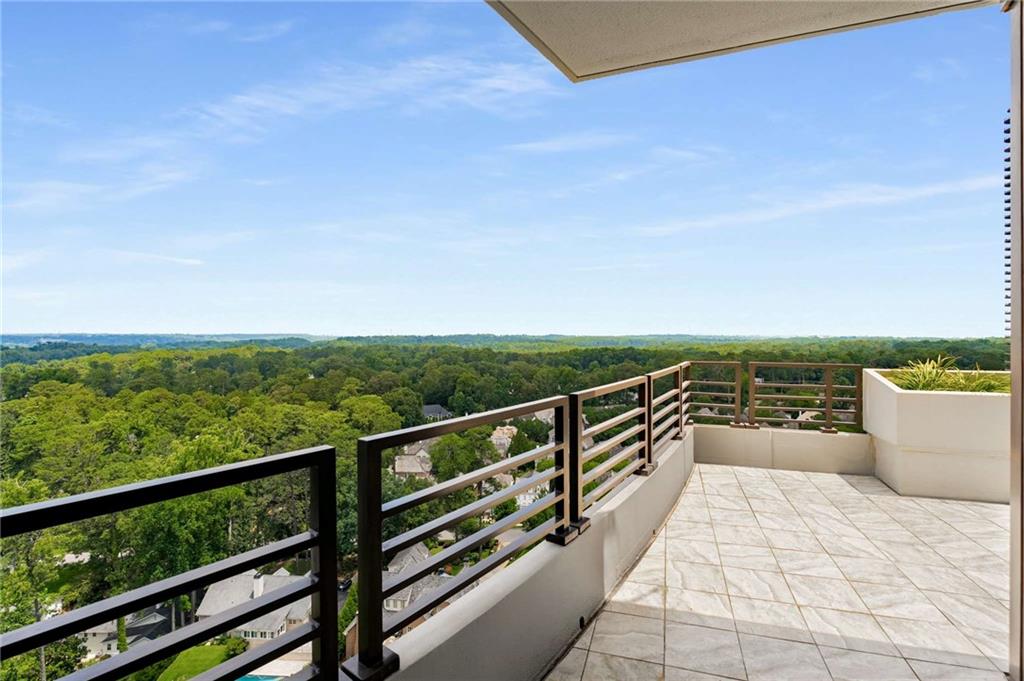700 Park Regency Place Northeast, Unit 2201 Atlanta, GA 30326 - Photo 27 of 47 a view of a balcony with city view