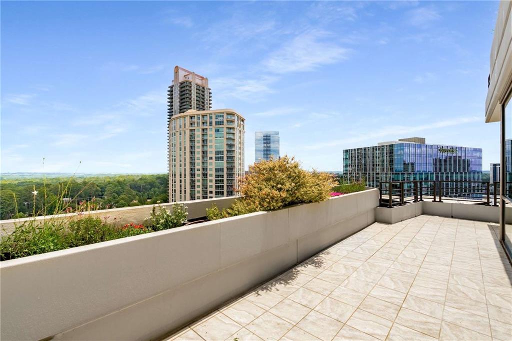 700 Park Regency Place Northeast, Unit 2201 Atlanta, GA 30326 - Photo 28 of 47 a view of terrace with city view