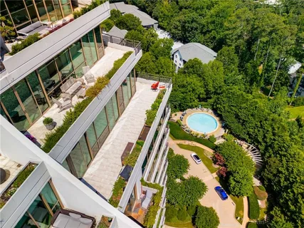 a view of a house with sitting area and garden