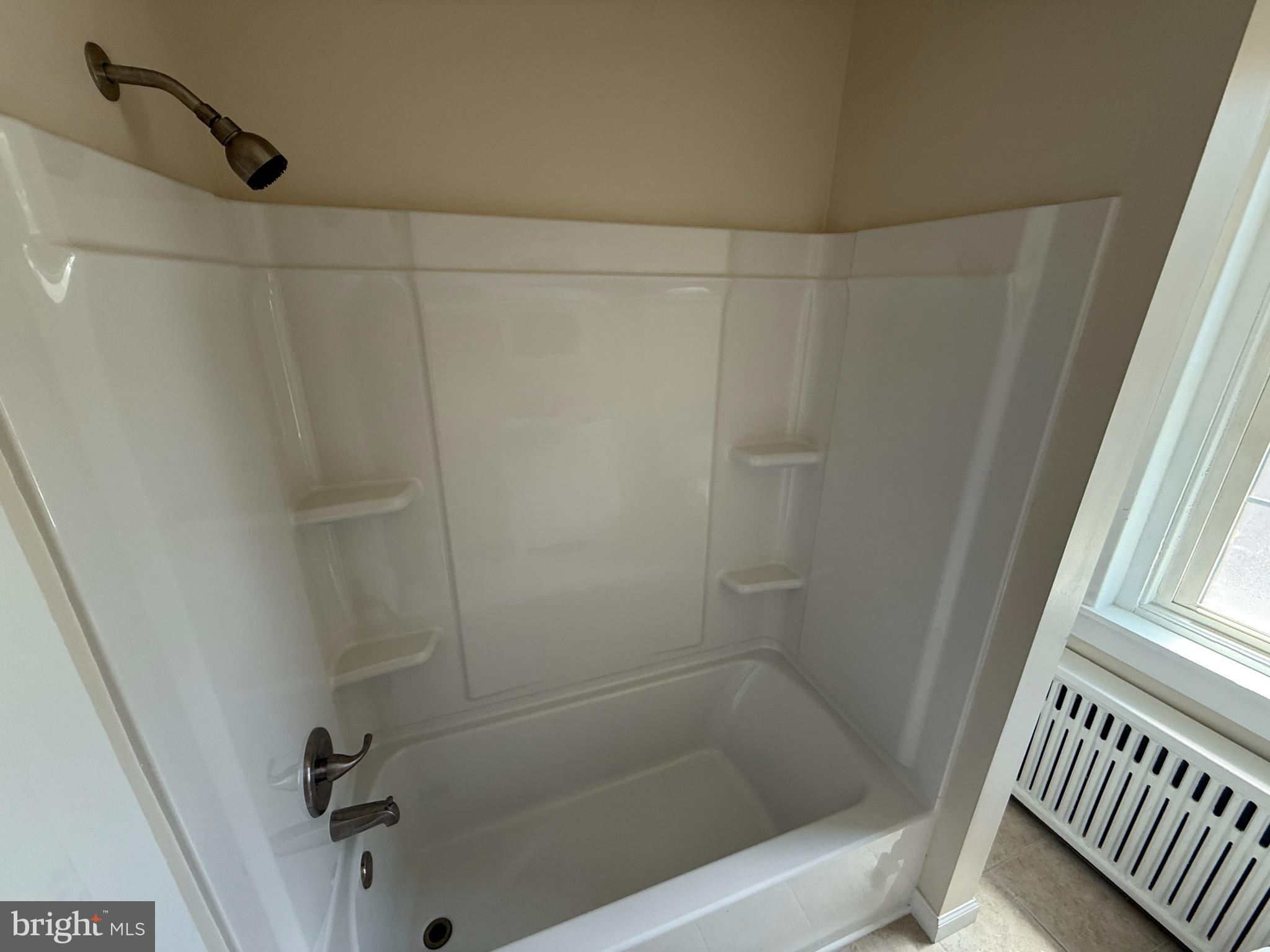 714 Wayne Avenue West Reading, PA 19611 - Photo 11 of 16 a bathroom with a bathtub