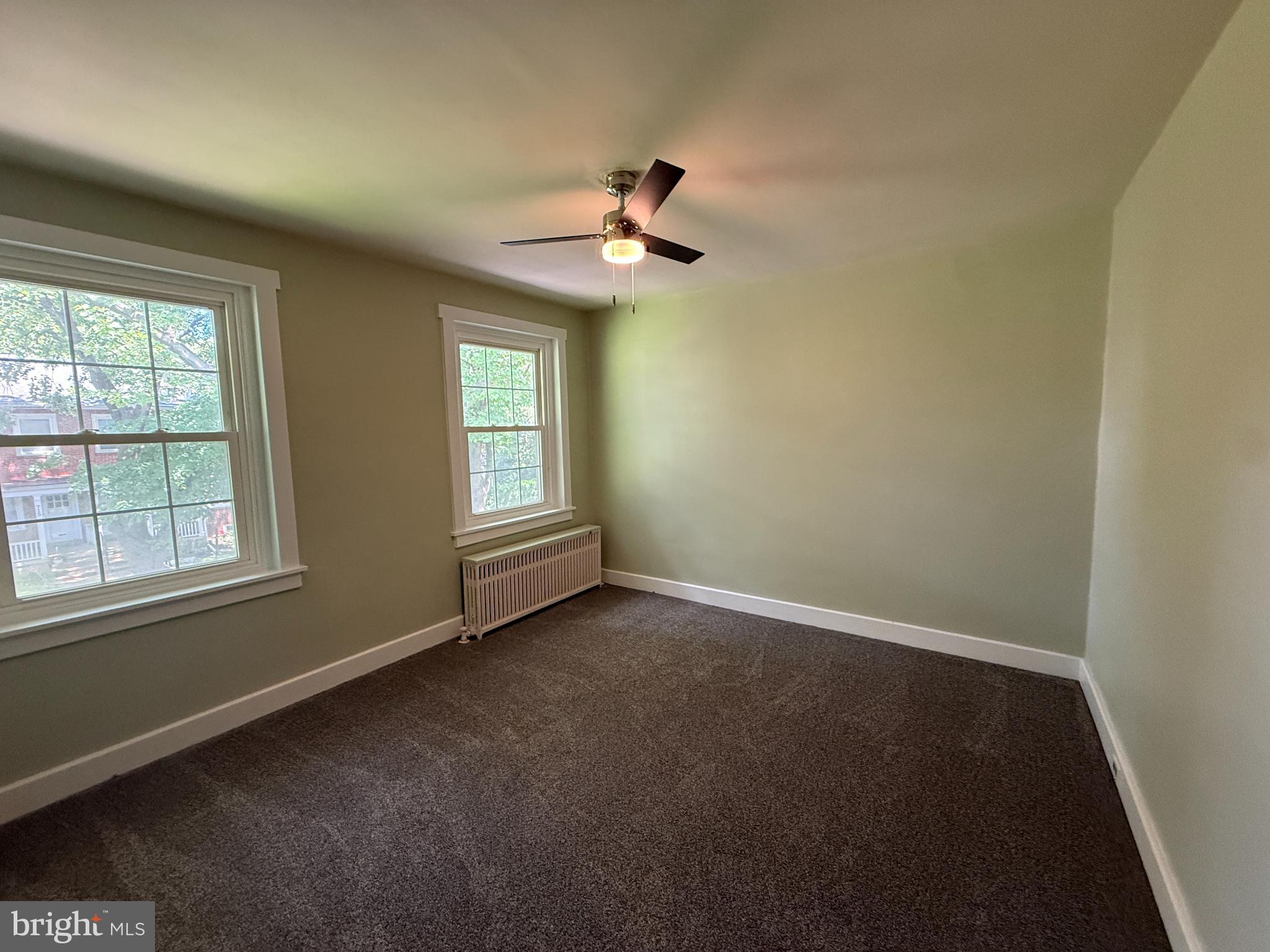 714 Wayne Avenue West Reading, PA 19611 - Photo 8 of 16 an empty room with windows and fan