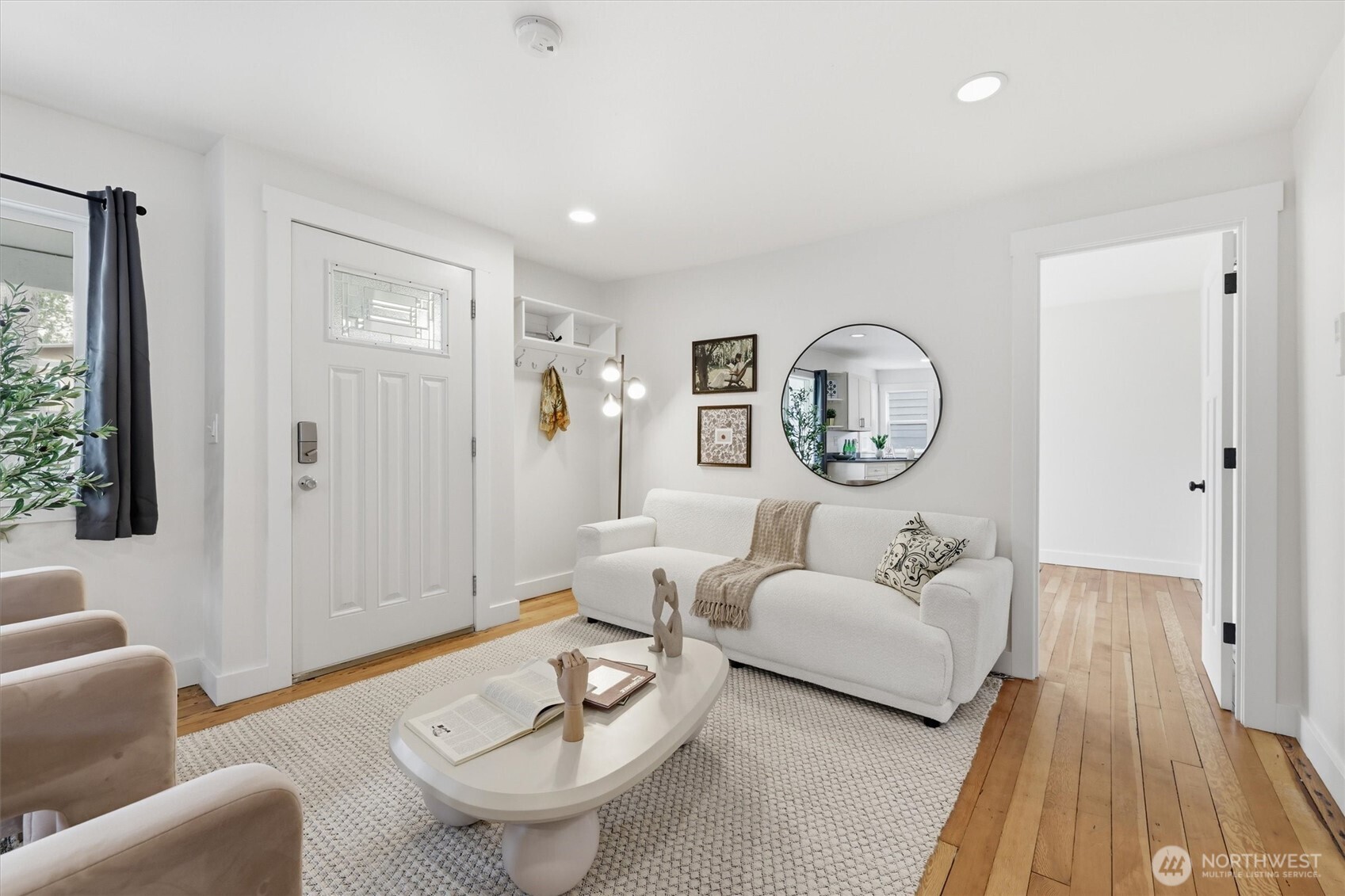 1651 Southwest 114th Street Seattle, WA 98146 - Photo 11 of 37 a living room with furniture and a large window