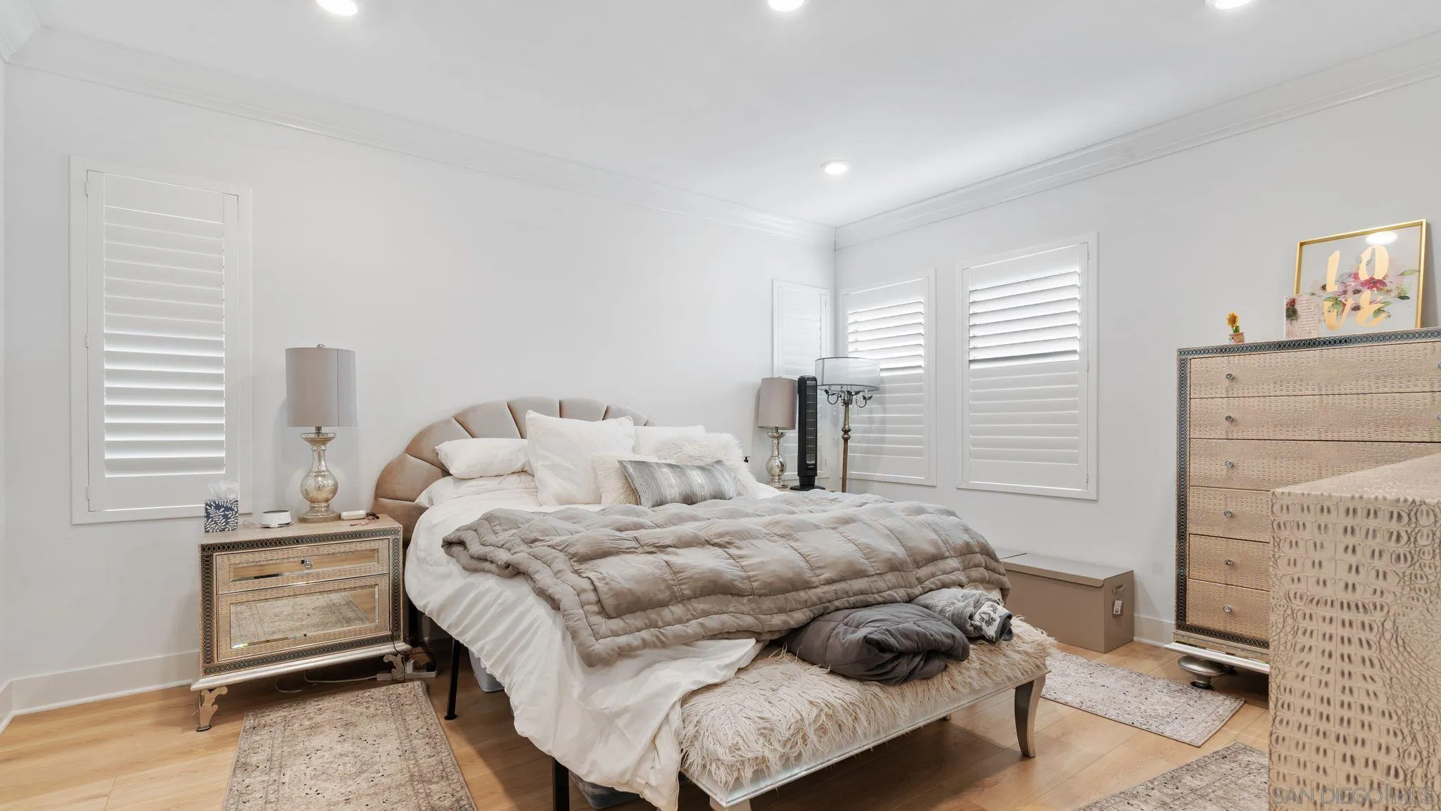 15681 Rennyson Way San Diego, CA 92129 - Photo 11 of 36 a bedroom with a bed and a dresser