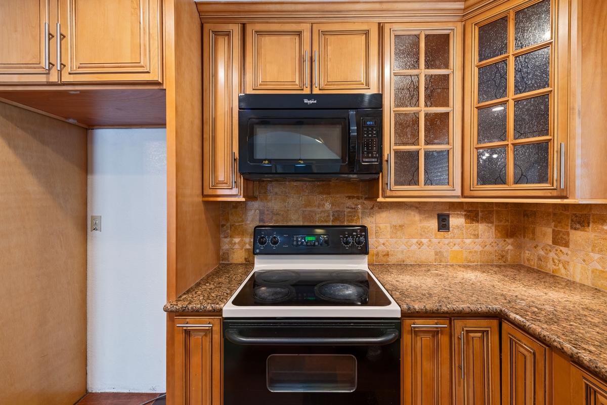 22 Sharon Drive Bay Point, CA 94565 - Photo 12 of 33 a kitchen with a stove and a sink