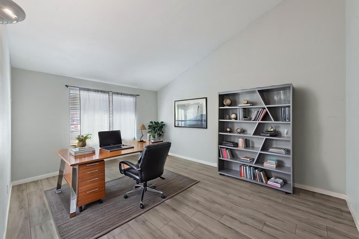 22 Sharon Drive Bay Point, CA 94565 - Photo 5 of 33 a view of a workspace with furniture and wooden floor