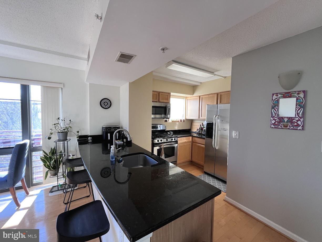 7923 Eastern Avenue Northwest, Unit 402 Silver Spring, MD 20910 - Photo 1 of 11