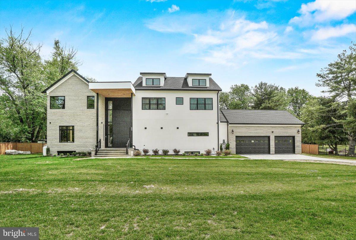 15807 Thompson Road Silver Spring, MD 20905 - Photo 1 of 82 a front view of house with yard