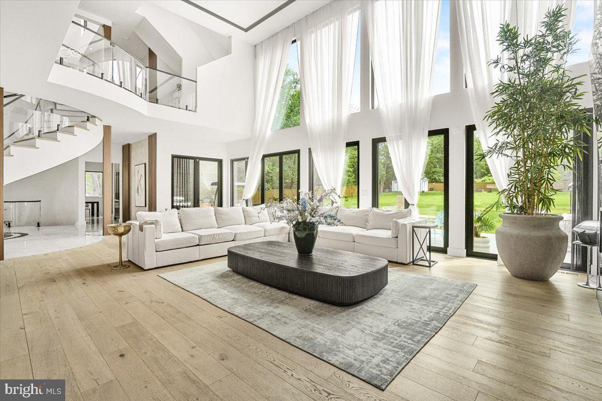 15807 Thompson Road Silver Spring, MD 20905 - Photo 15 of 82 a living room with furniture and a large window