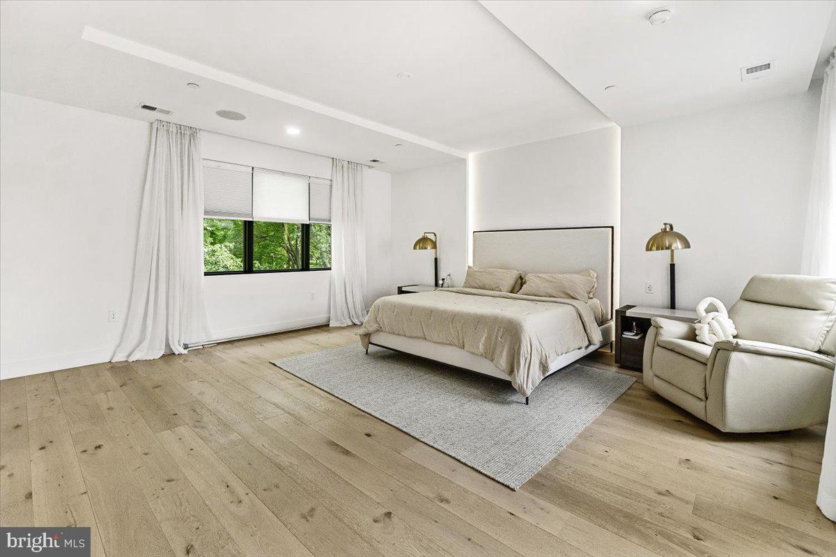 15807 Thompson Road Silver Spring, MD 20905 - Photo 29 of 82 a bedroom with a bed window and couch