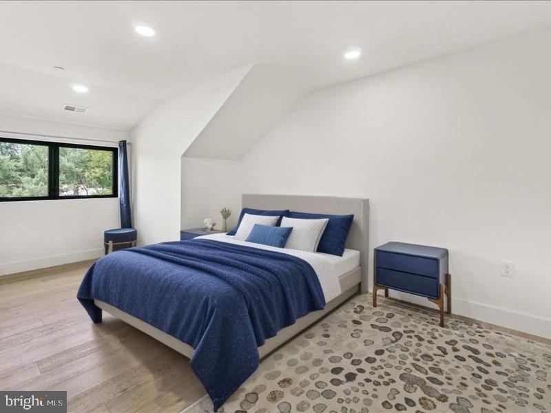 15807 Thompson Road Silver Spring, MD 20905 - Photo 49 of 82 a bedroom with a bed and a dresser