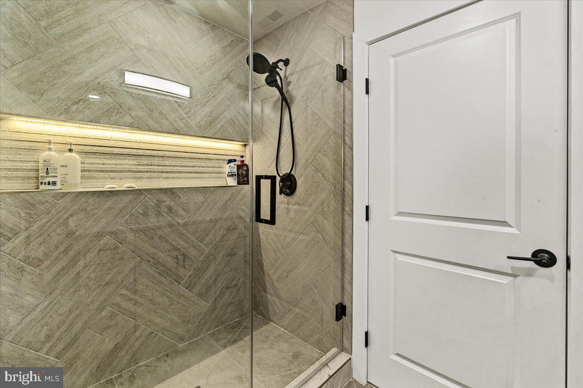 15807 Thompson Road Silver Spring, MD 20905 - Photo 52 of 82 a bathroom with a shower