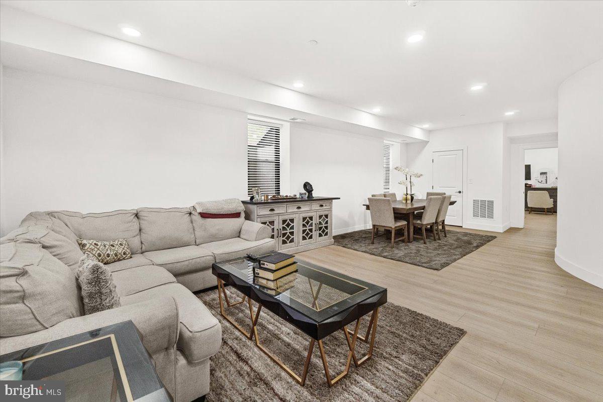 15807 Thompson Road Silver Spring, MD 20905 - Photo 64 of 82 a living room with furniture and a table